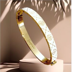 TORY BURCH LACQUERED KIRA RAISE LOGO IN BEIGE AND GOLD